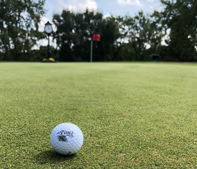 Branded golf ball on the The Pines Country Club golf course in Morgantown, WV